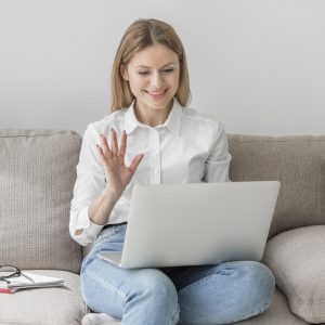 woman-waving-her-class-online